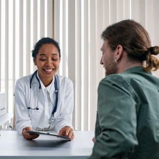 a cheerful doctor having a consultation with a patient